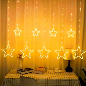 Светодиодная новогодняя гирлянда ЭРА  ЕGNIG - ST занавес Неоновые звезды 8 режимов 2,4*0,8 м теплый свет IP20