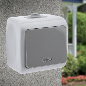 Выключатель Intro Atlantic 5-102-03 с подсветкой, 10А-250В, IP54, открытой установки, серый Выключатель Intro Atlantic 5-102-03 с подсветкой, 10А-250В, IP54, открытой установки, серый